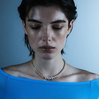bowling asymmetry necklace
