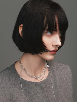 asym coin necklace